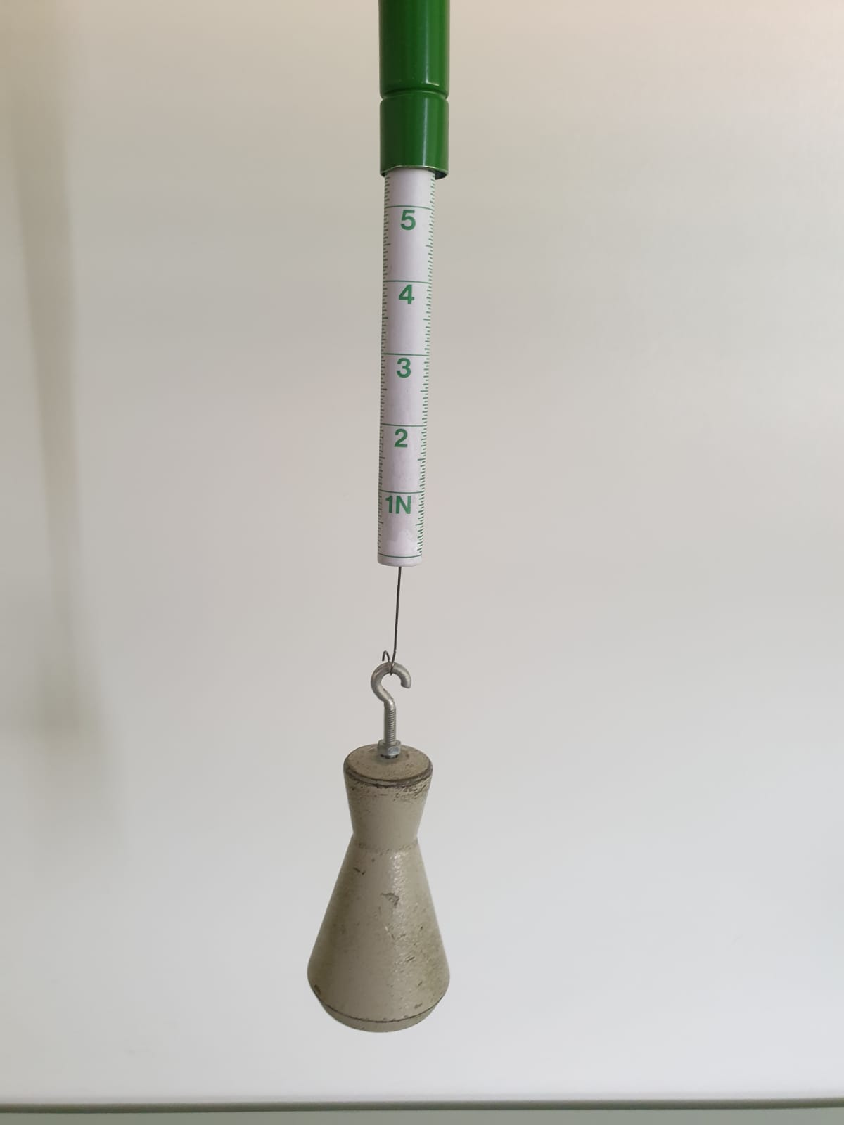 Force meter for measuring the applied force like the weight of this metal ball.